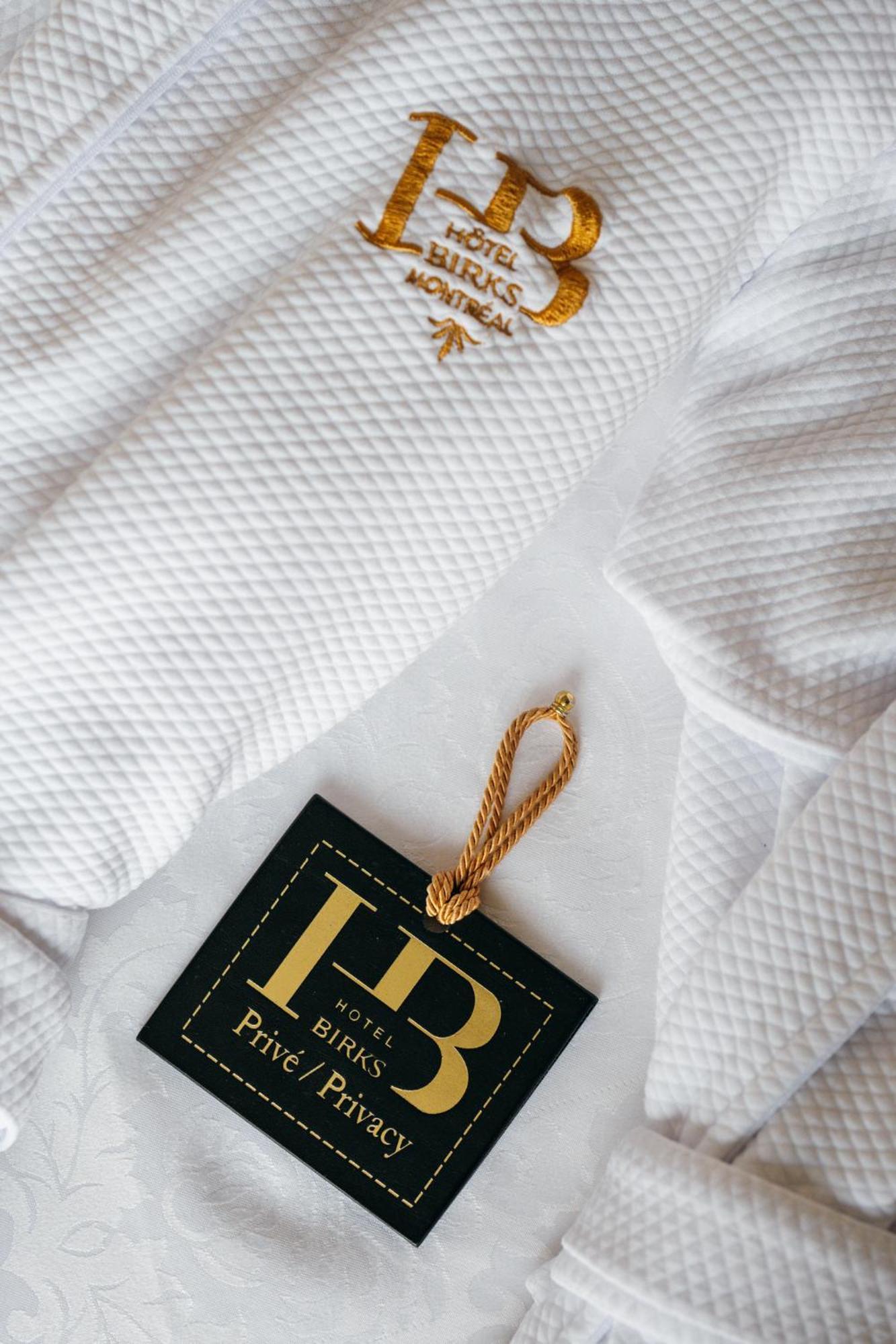 Hotel Birks Montreal Exterior photo A gold-plated bookmark